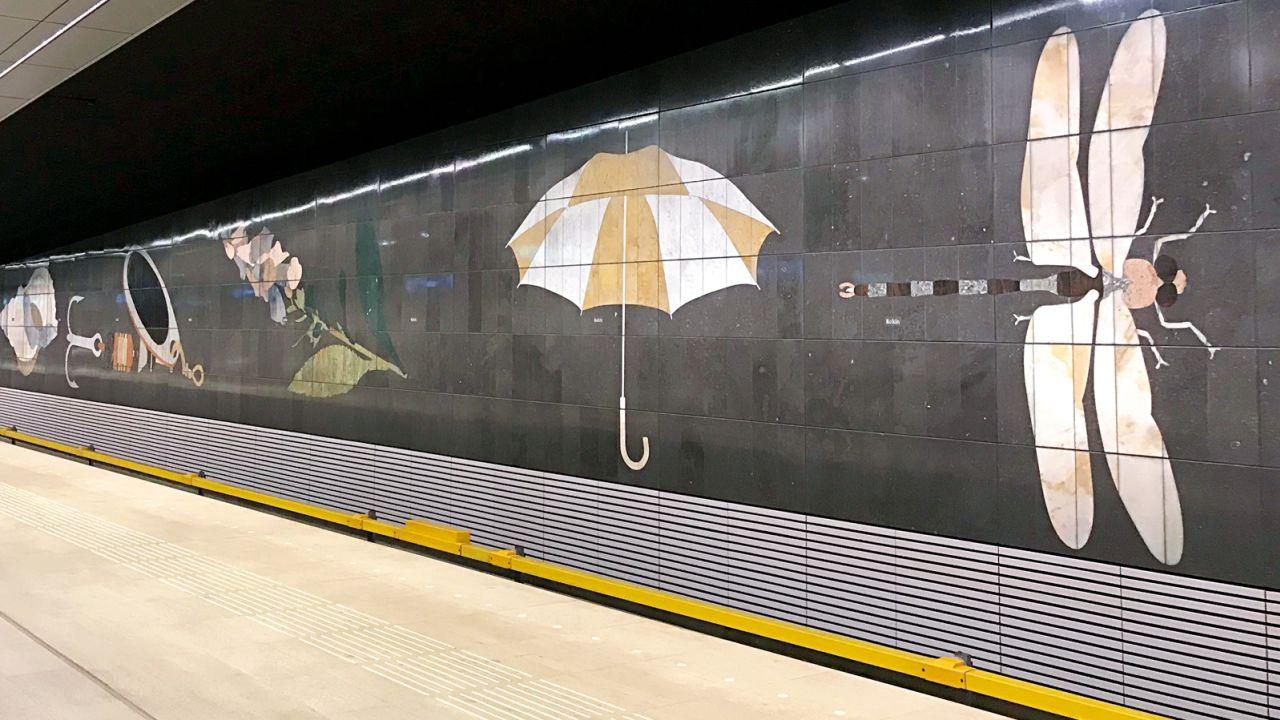 Artwork on Rokin station's walls represents objects found in its construction.